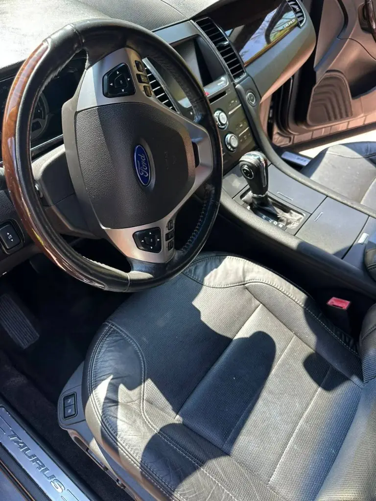 Clean steering wheel and driver seat after interior detailing