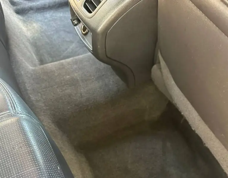Clean rear footwell after detailing