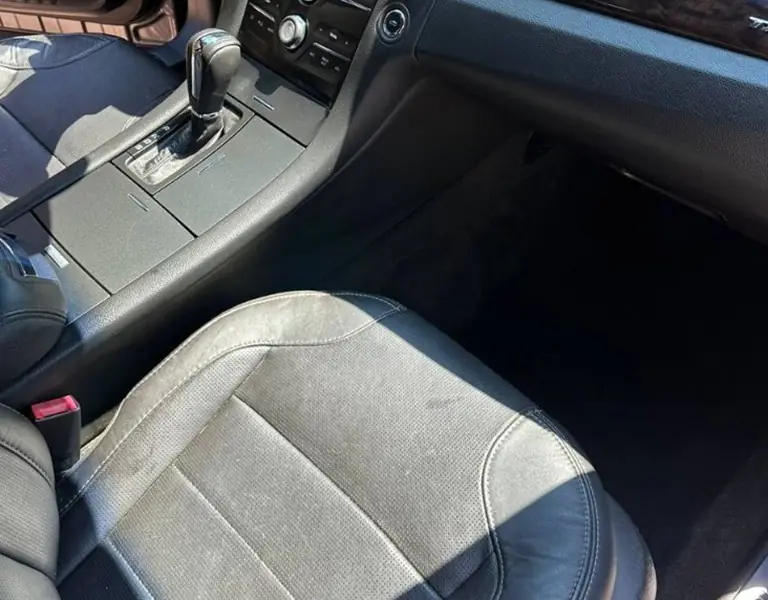Clean passenger seat and floor after detailing